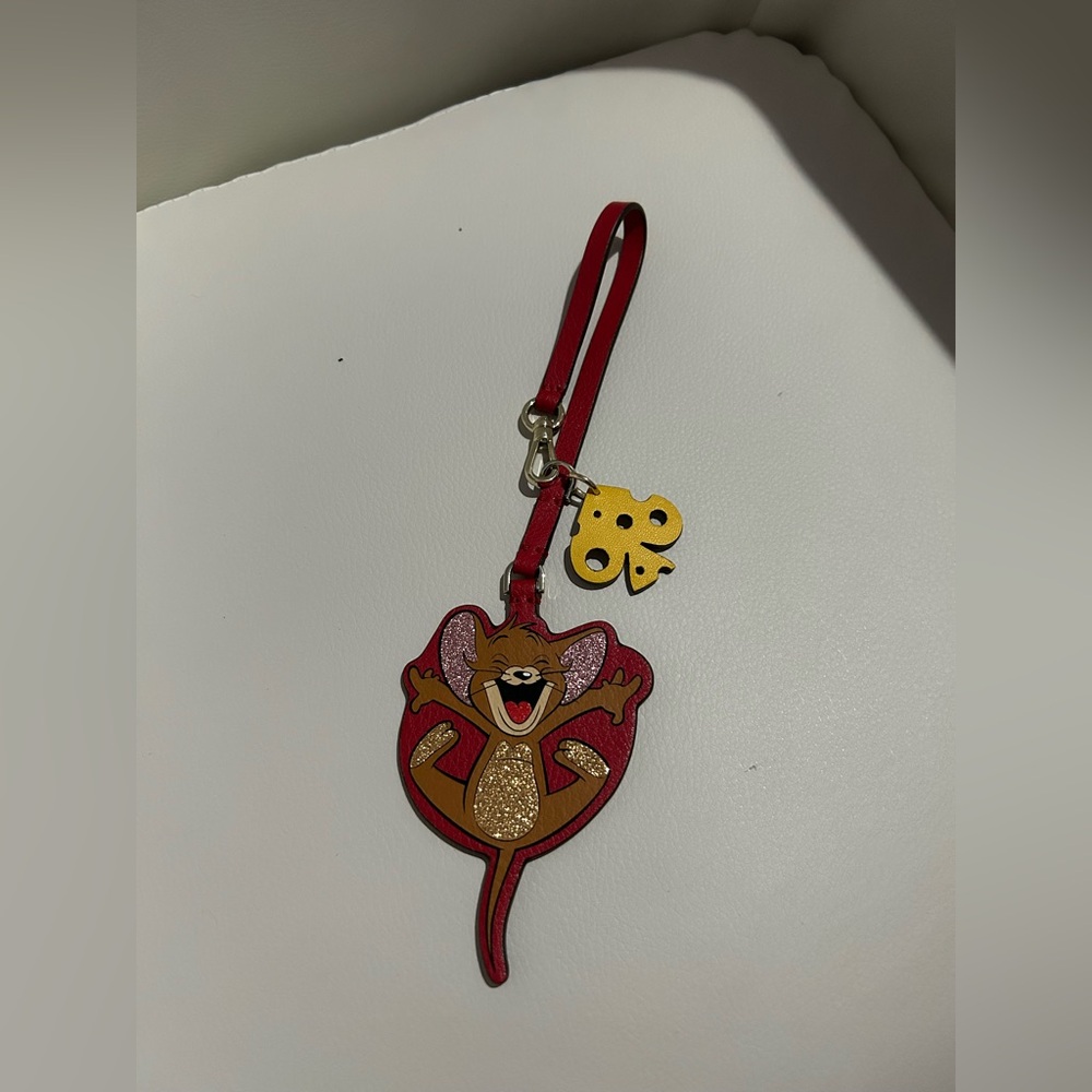 Kate Spade X Tom and Jerry collab bag charm.